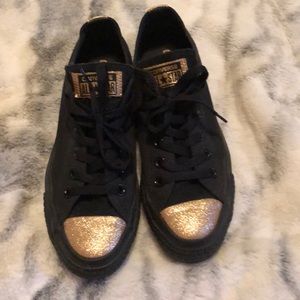 Black and gold converse